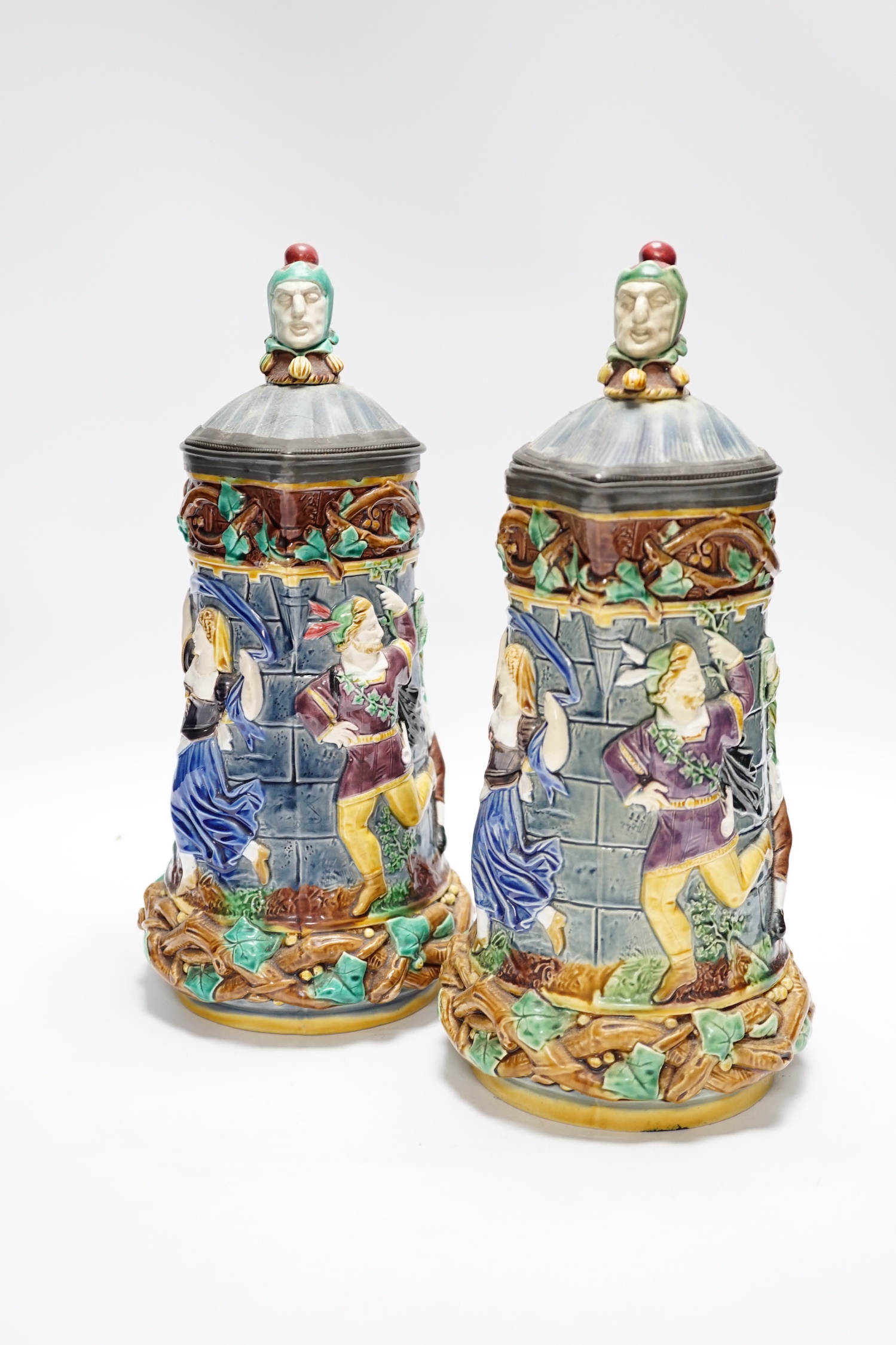 A pair of Victorian Minton majolica ‘Tower’ jugs, 33cm high